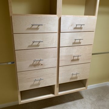 custom wood cabinets in the closet