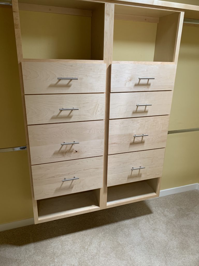 custom wood cabinets in the closet